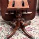 Victorian extendable dining table. Rosewood, bronze decoration. England. Early 19th century.