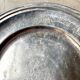 Round silver-plated metal dish monogrammed "MR"