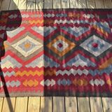 Multicoloured handmade wool kilim rug. Turkey, 1970s.