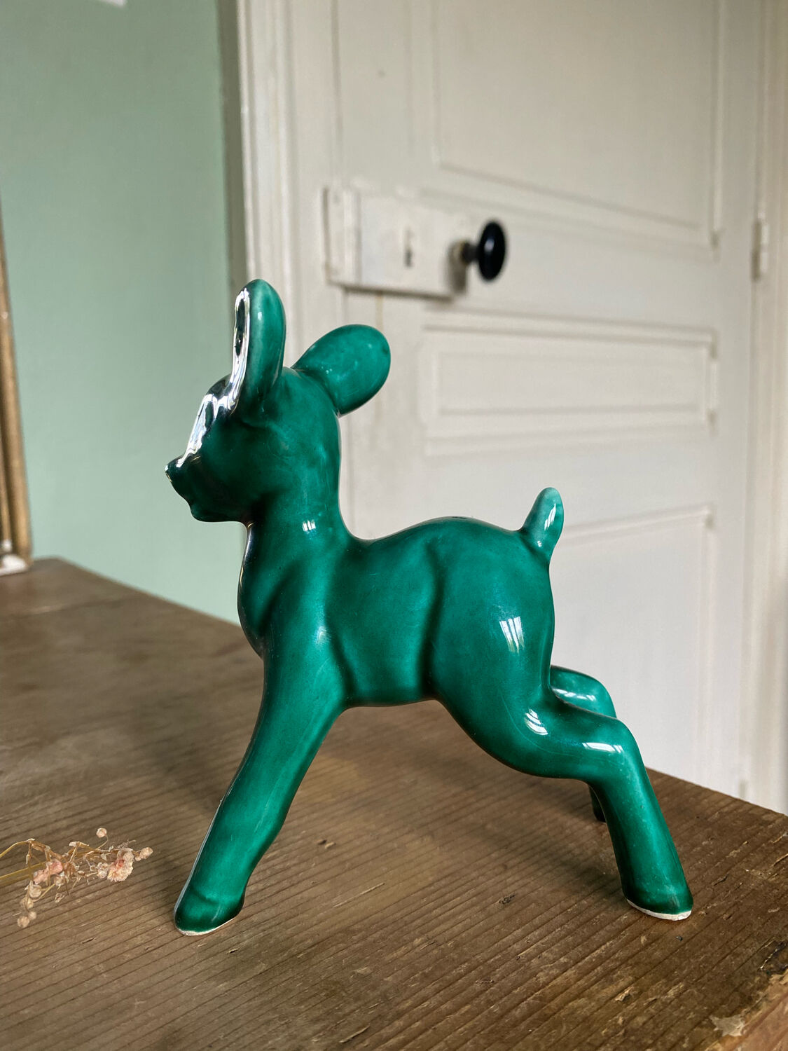 Art Nouveau green glazed ceramic fawn