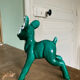 Art Nouveau green glazed ceramic fawn