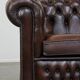 Beautiful and spacious dark brown mottled English cow leather Chesterfield armchair