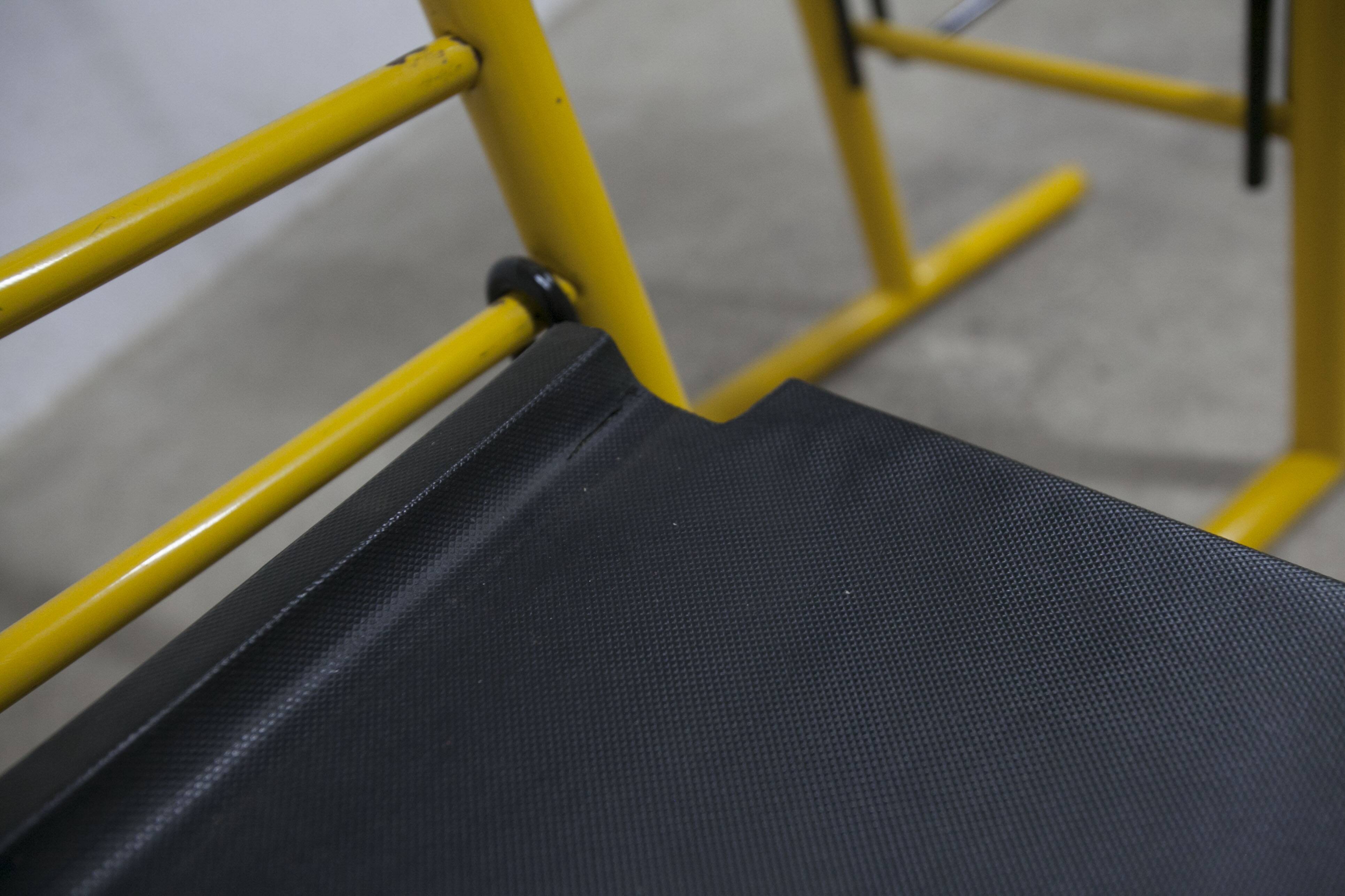 Pair of adjustable Italian bar stools in lacquered yellow and black