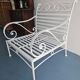 Robust wrought iron armchair