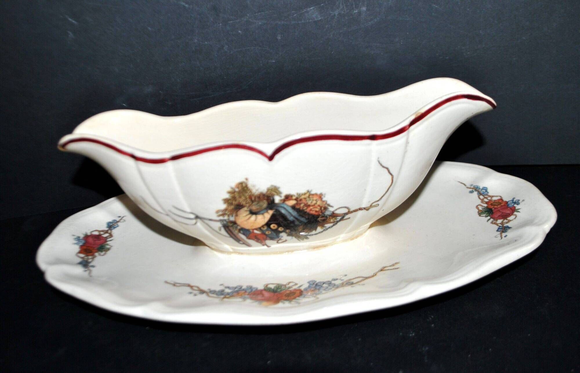 Sarreguemines sauce boat and dish in earthenware with "Obernai" decoration by Henri Loux