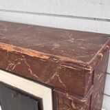 Wooden fireplace mantel imitating marble
