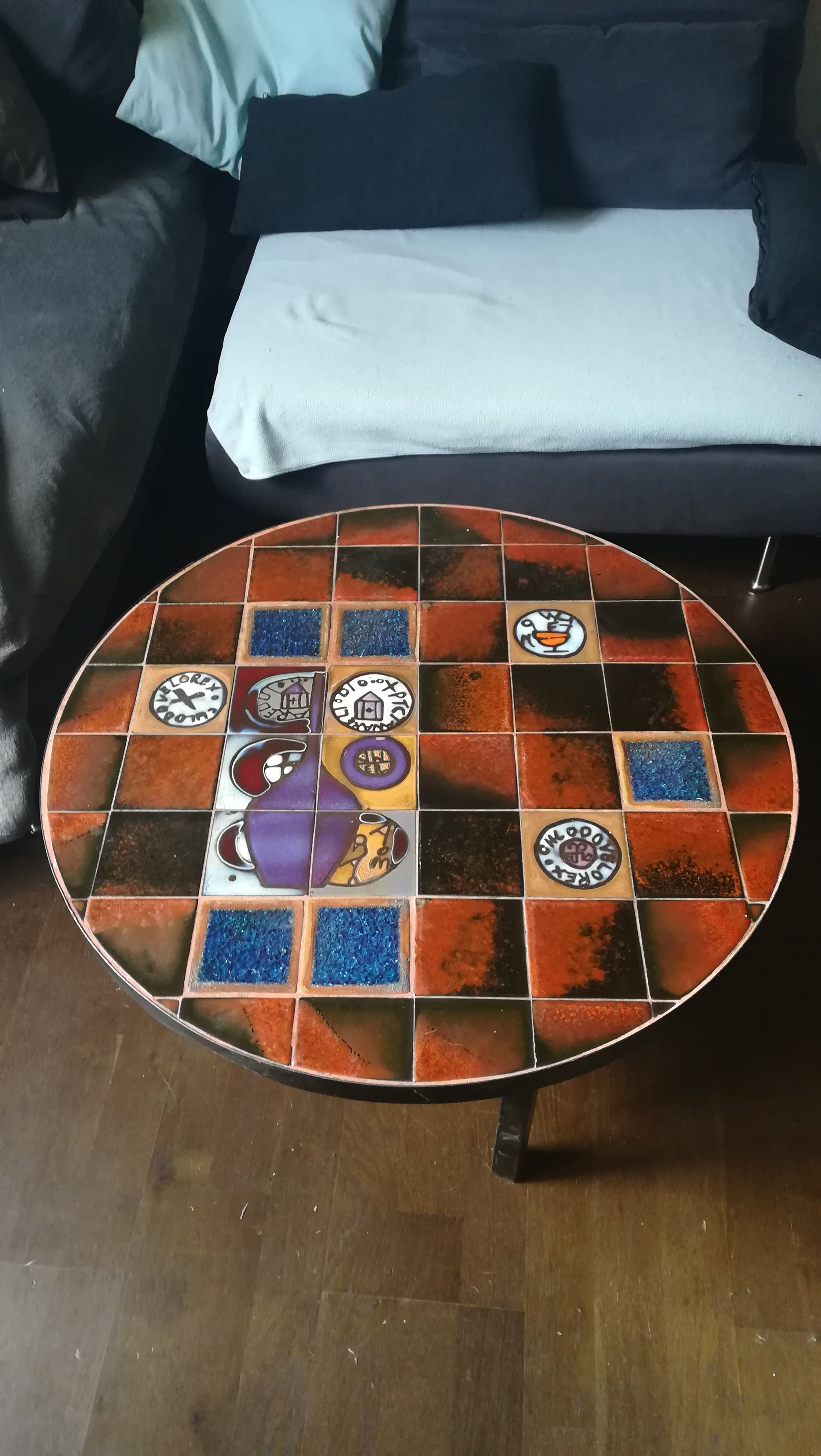 Coffee table, ceramic tray, metal feet, circa 1960