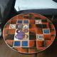 Coffee table, ceramic tray, metal feet, circa 1960