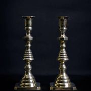 Pair of Victorian copper and brass candlesticks