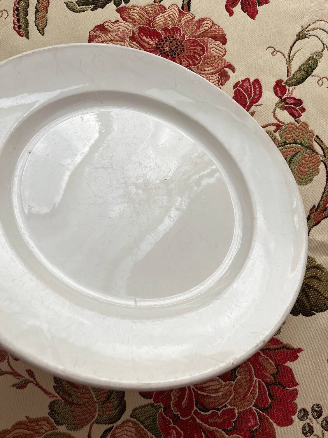 Round white ironstone dish from Creil and Montereau