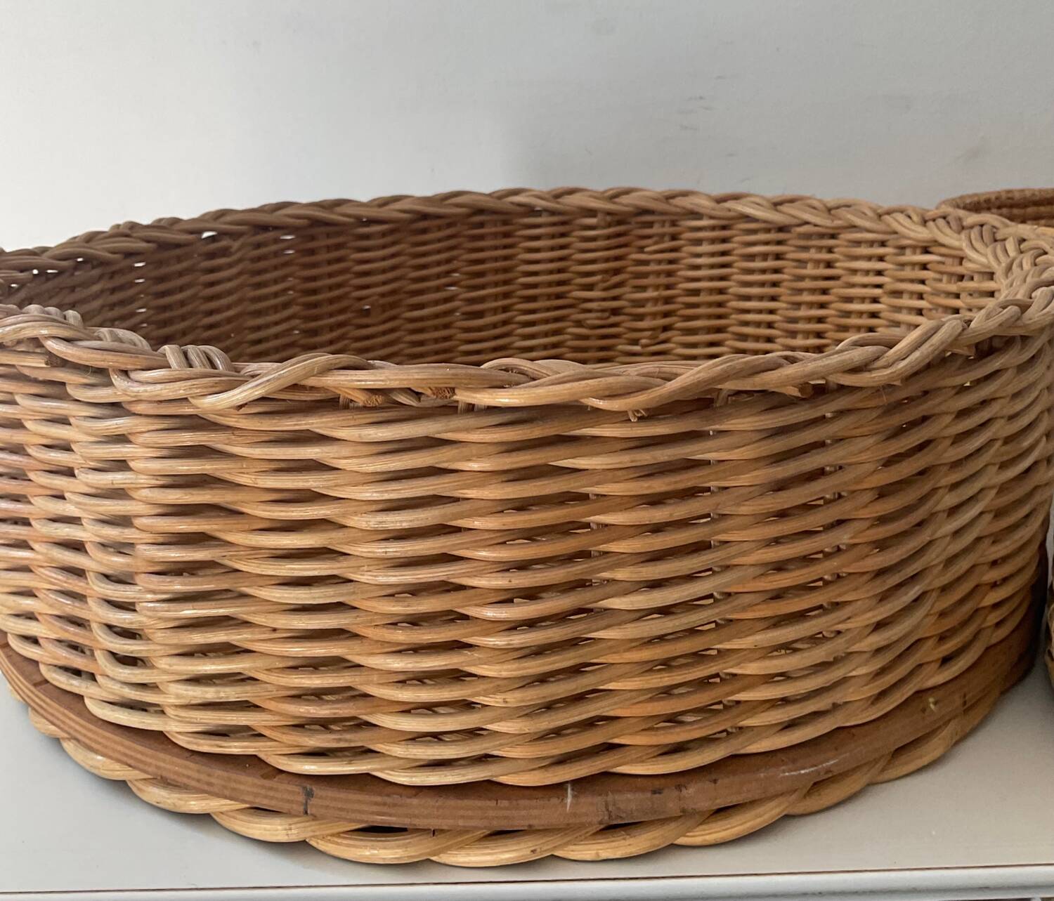 Trio of vintage wicker and woven raffia baskets