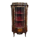 Curved display cabinet in Louis XV style with precious wood marquetry and gilded bronze.