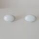 Pair of vintage door handles in porcelain and brass.
