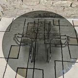 Round chrome coffee table with smoked glass