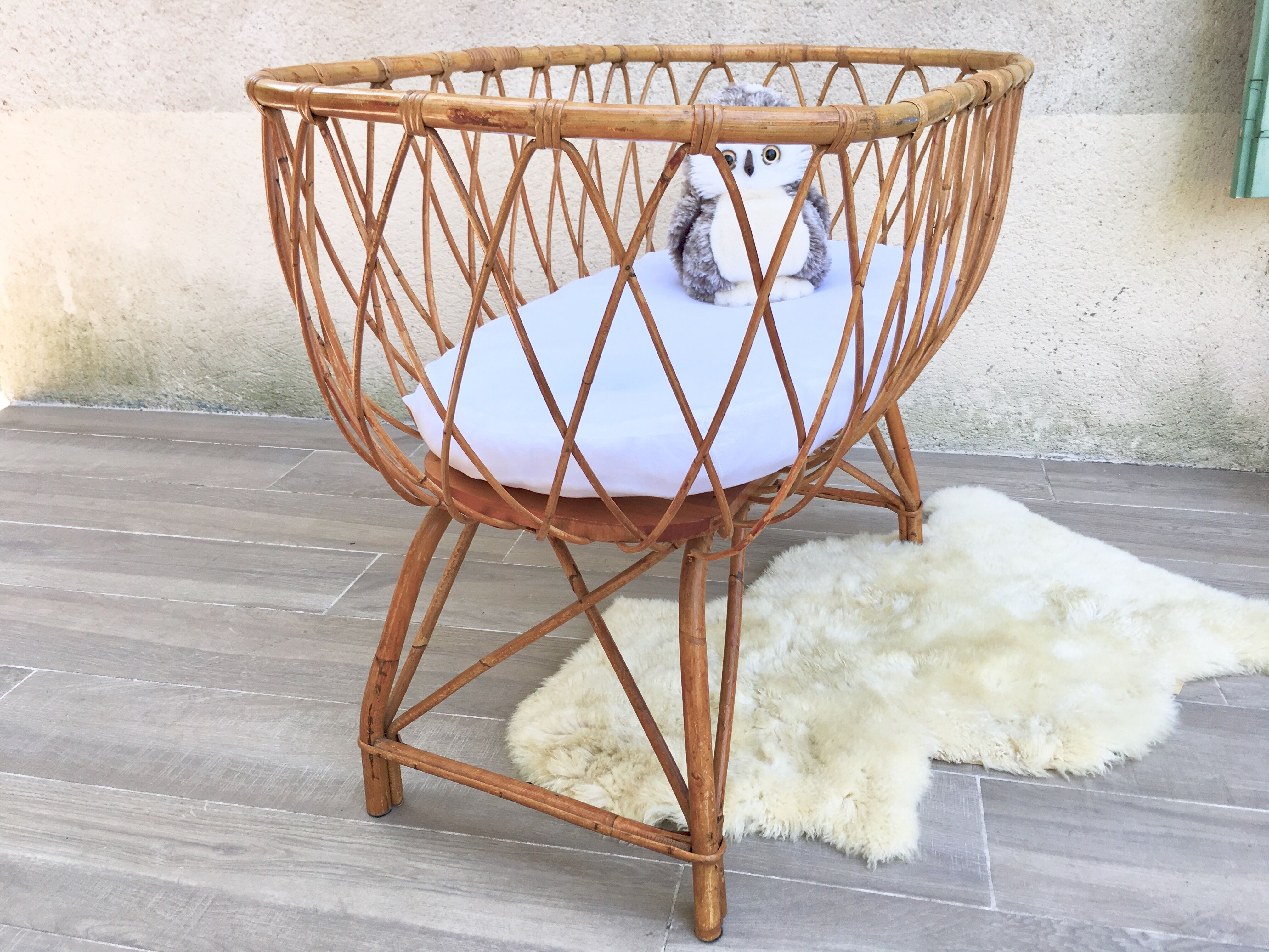 Vintage rattan cradle