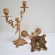 Pair of vintage golden brass cherub candlesticks