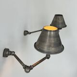 Pairs of adjustable vintage wall lights in steel, France, 1970.