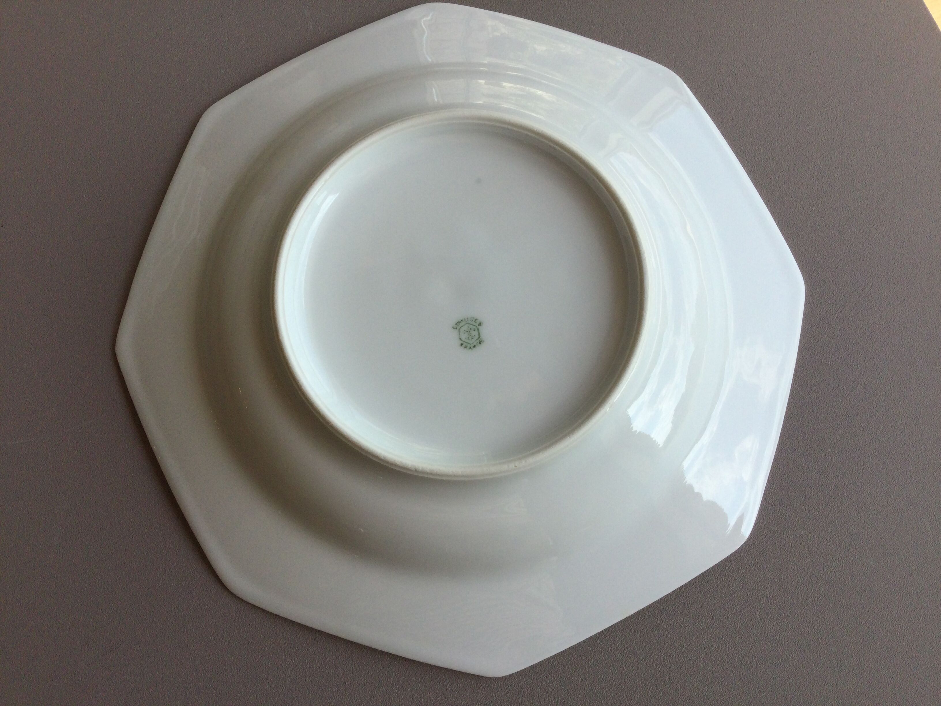 8 white hollow plates in Limoges porcelain
