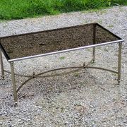 Chrome metal coffee table with smoked glass top in neoclassical style, 1970s.