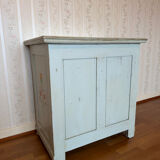 Antique low polychrome sideboard with floral decoration.