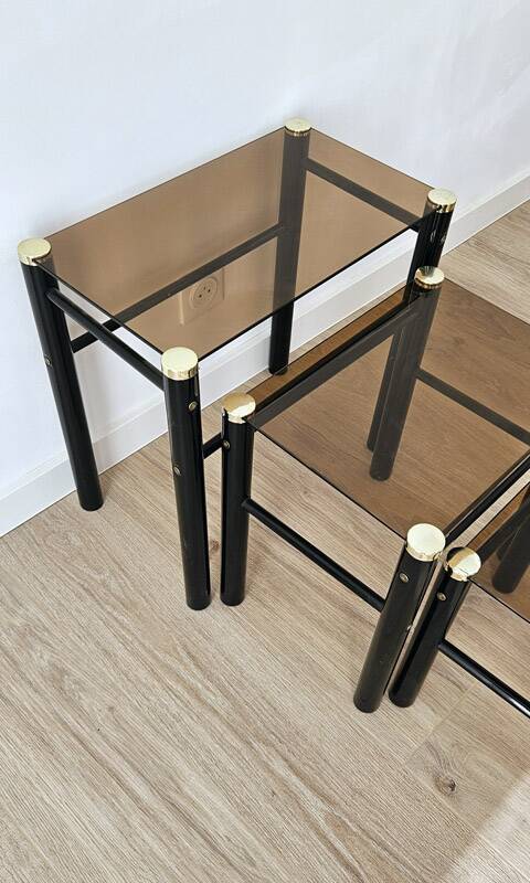 Set of 3 vintage nesting tables in smoked glass and black metal – 1970s