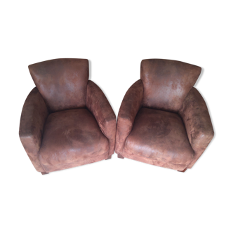 2 brown club chairs