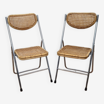 Pair of vintage metal and cane folding chairs