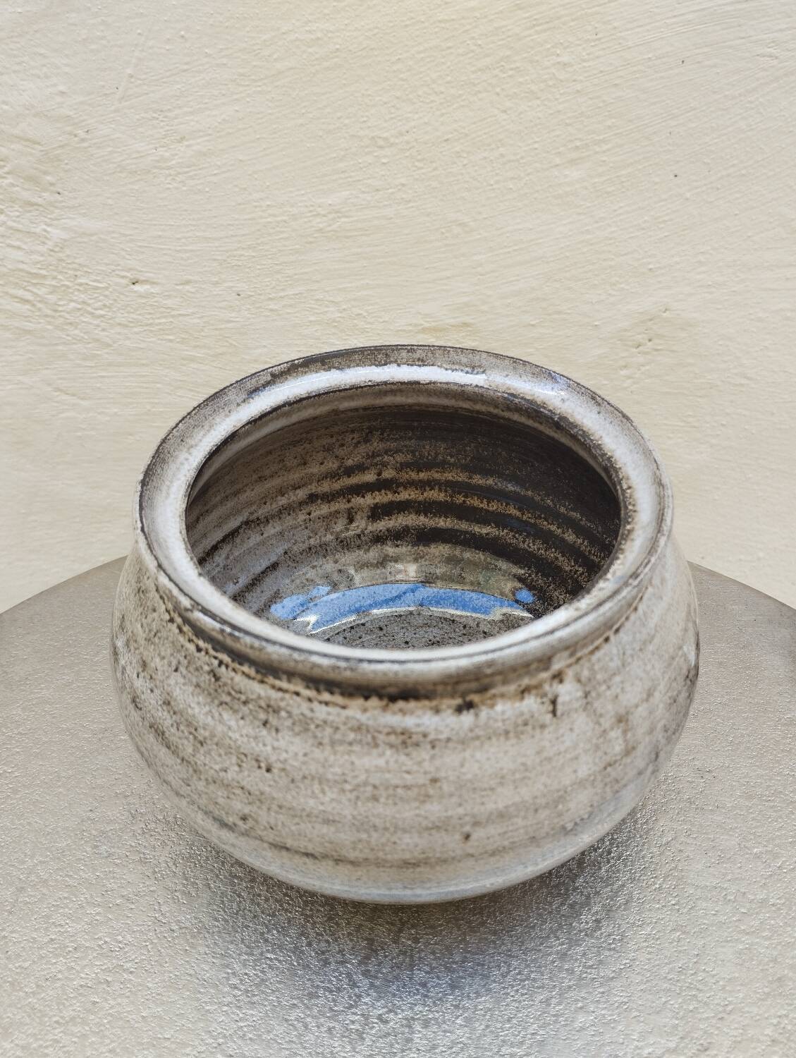 Covered enameled earthenware pot