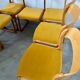 Set of 7 Baumann sled chairs in wood and mustard yellow fabric, 1960s