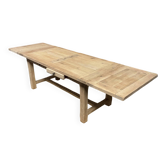 Solid oak farmhouse table with extensions.
