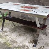 Coffee table with ceramic top.