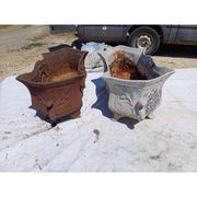 Pair of 1900 cast iron planters from Charleville-Mézières in rococo style