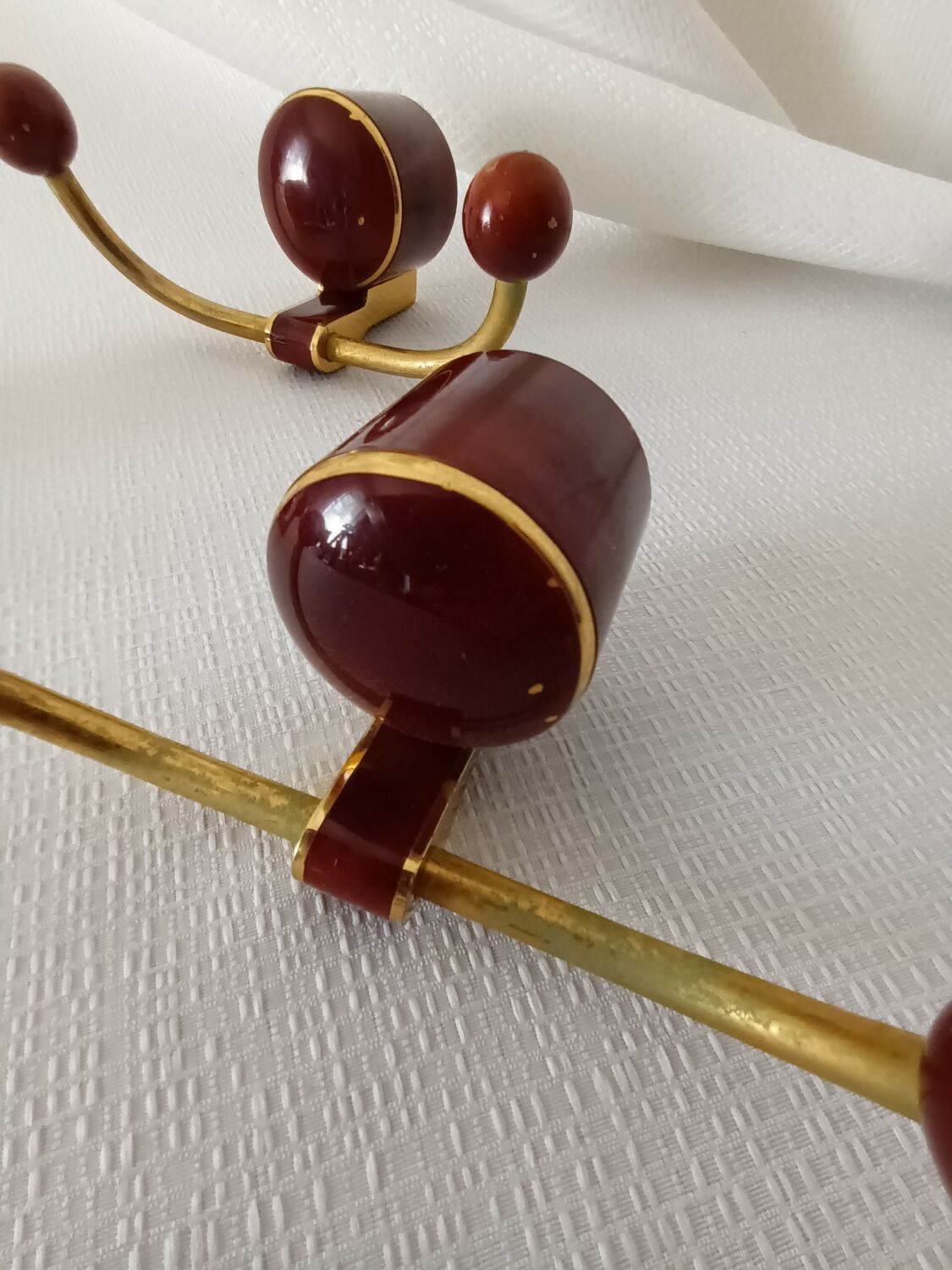 Art deco bakelite brass hooks