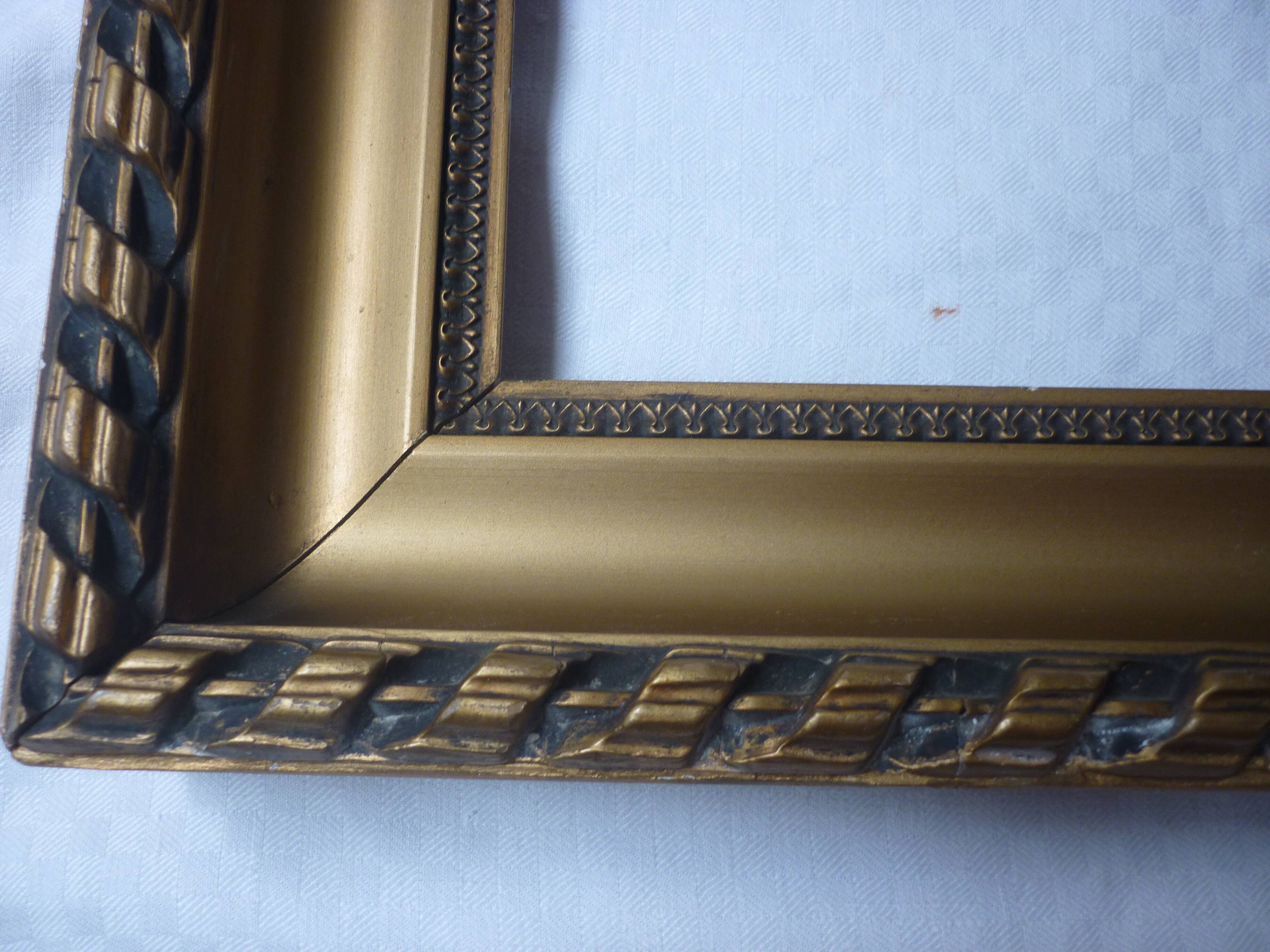 Gilded wood and stucco frame