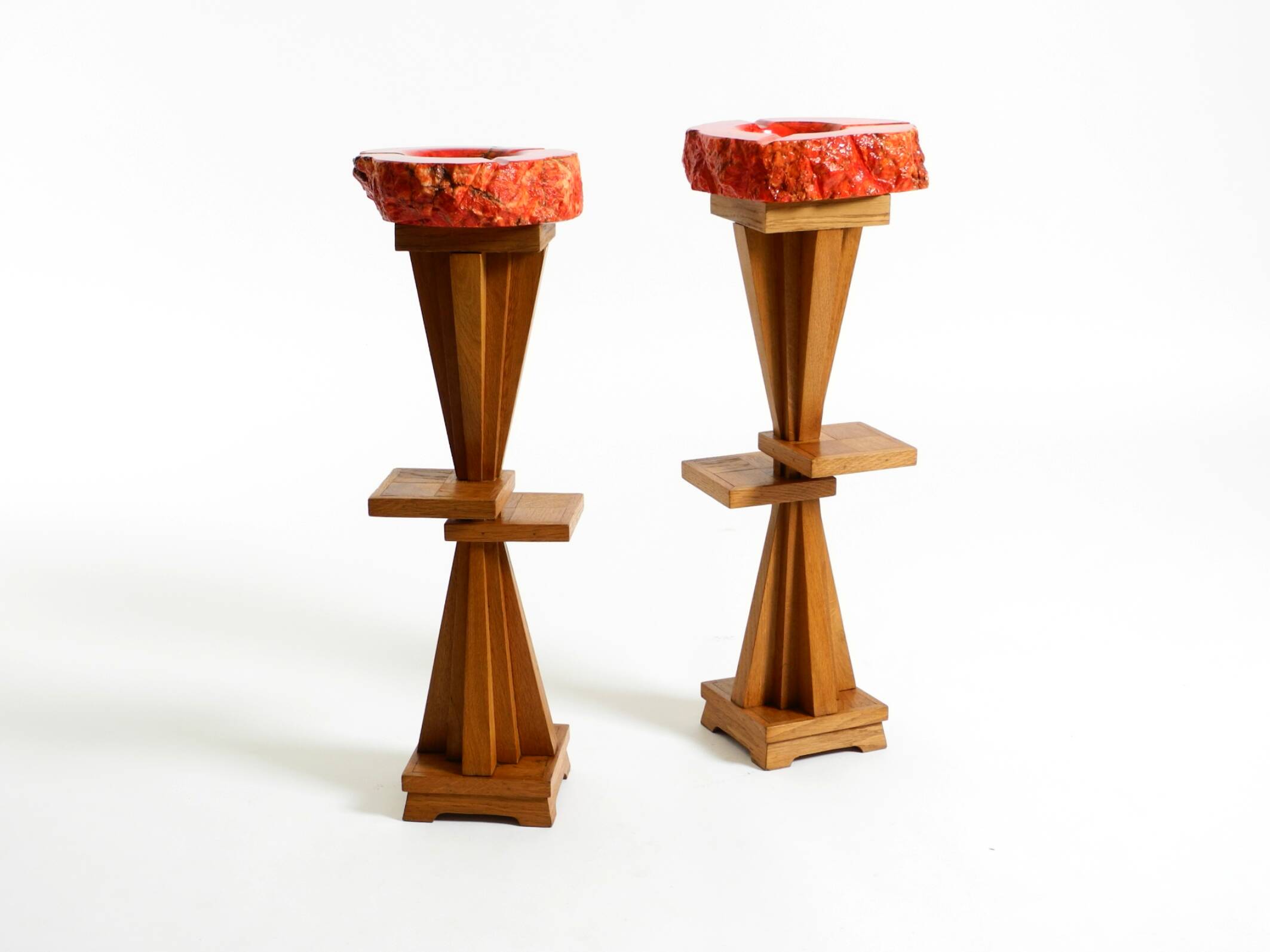 Two mid-century standing ashtrays consisting of red Alabaster cup