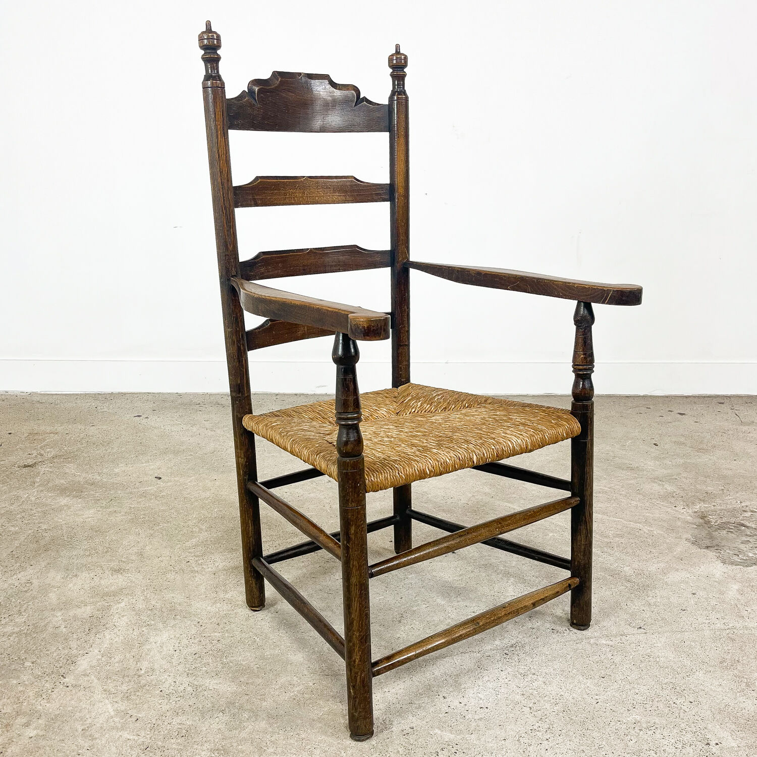 Antique oak wooden farmhouse armchair with cane seat Zutphen