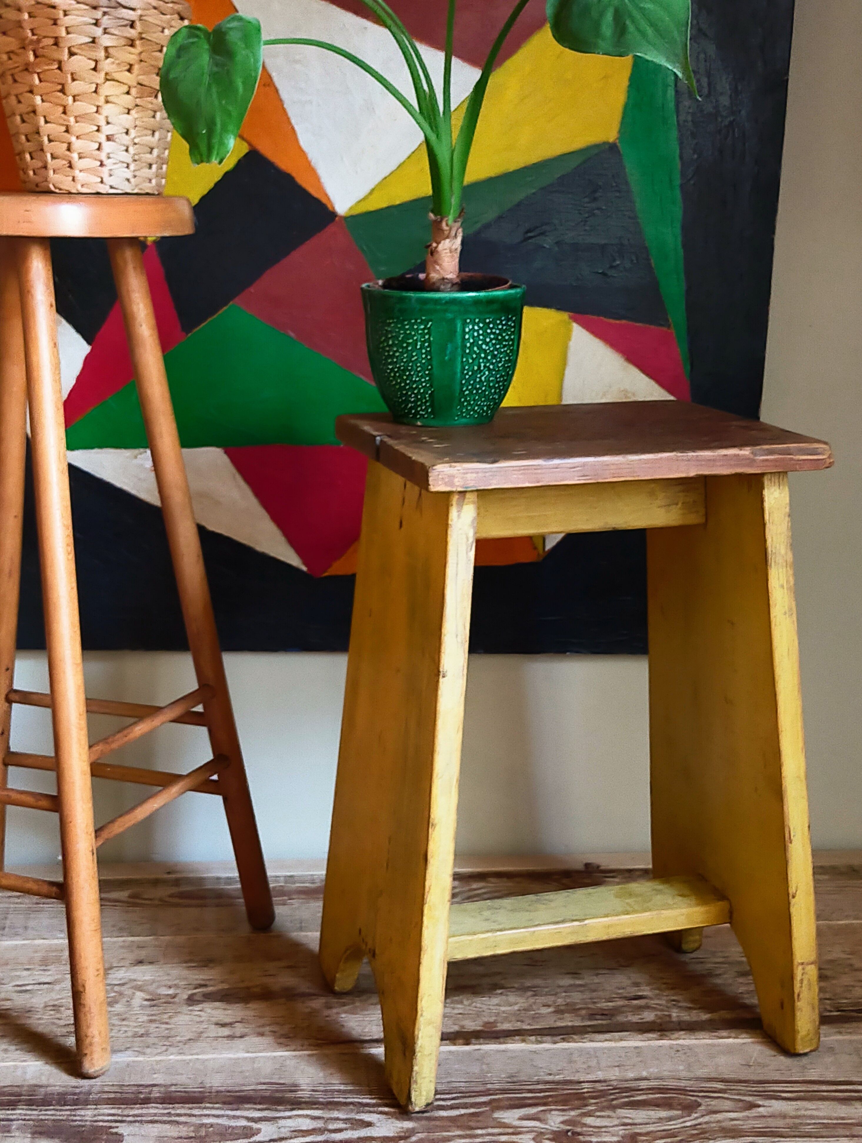 Art-populaire workshop stool in patinated painted wood