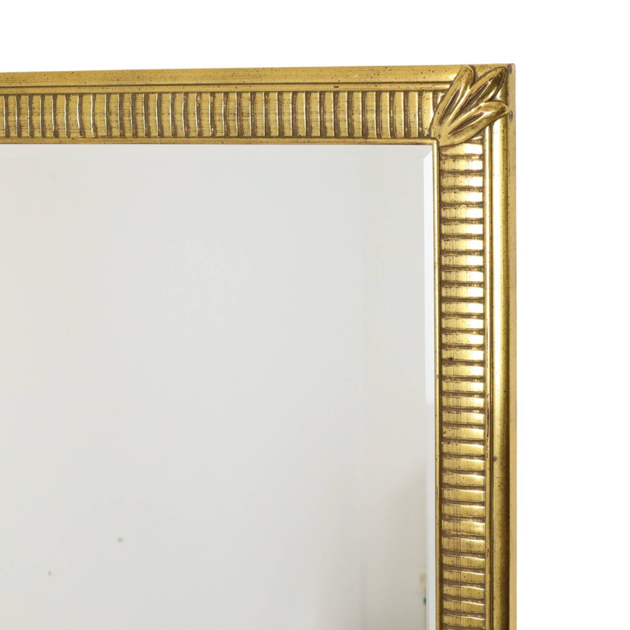 Miroir Deknudt en or Hollywood Regency biseauté 92 cm