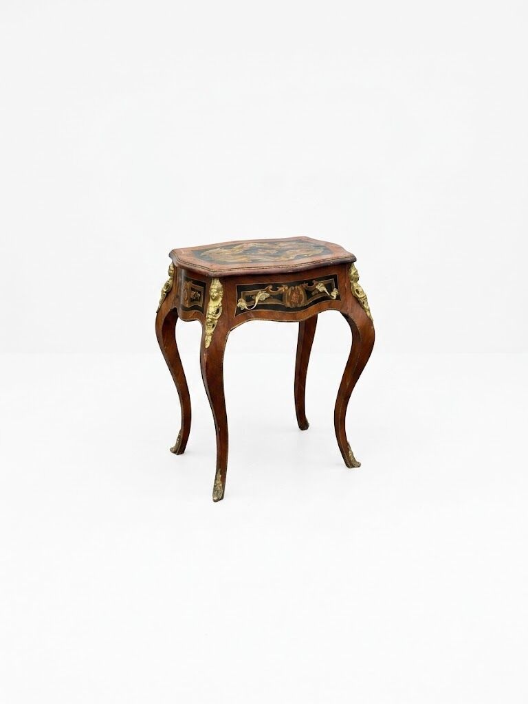 Louis XV style side table with marquetry and gilded bronze.