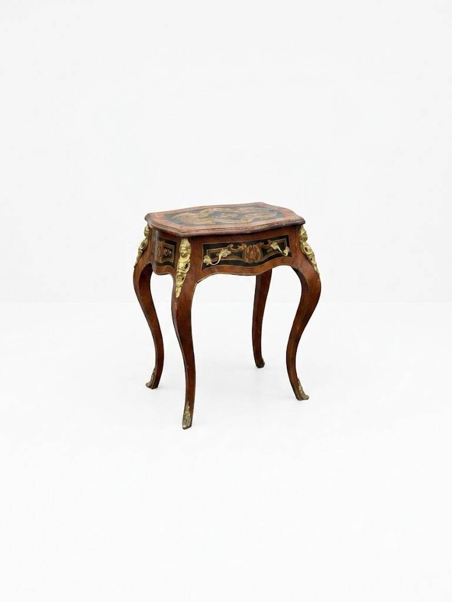 Louis XV style side table with marquetry and gilded bronze.