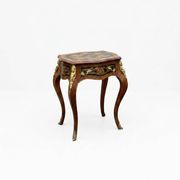 Louis XV style side table with marquetry and gilded bronze.