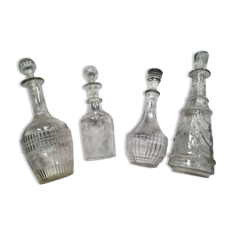 Set of four glass carafes