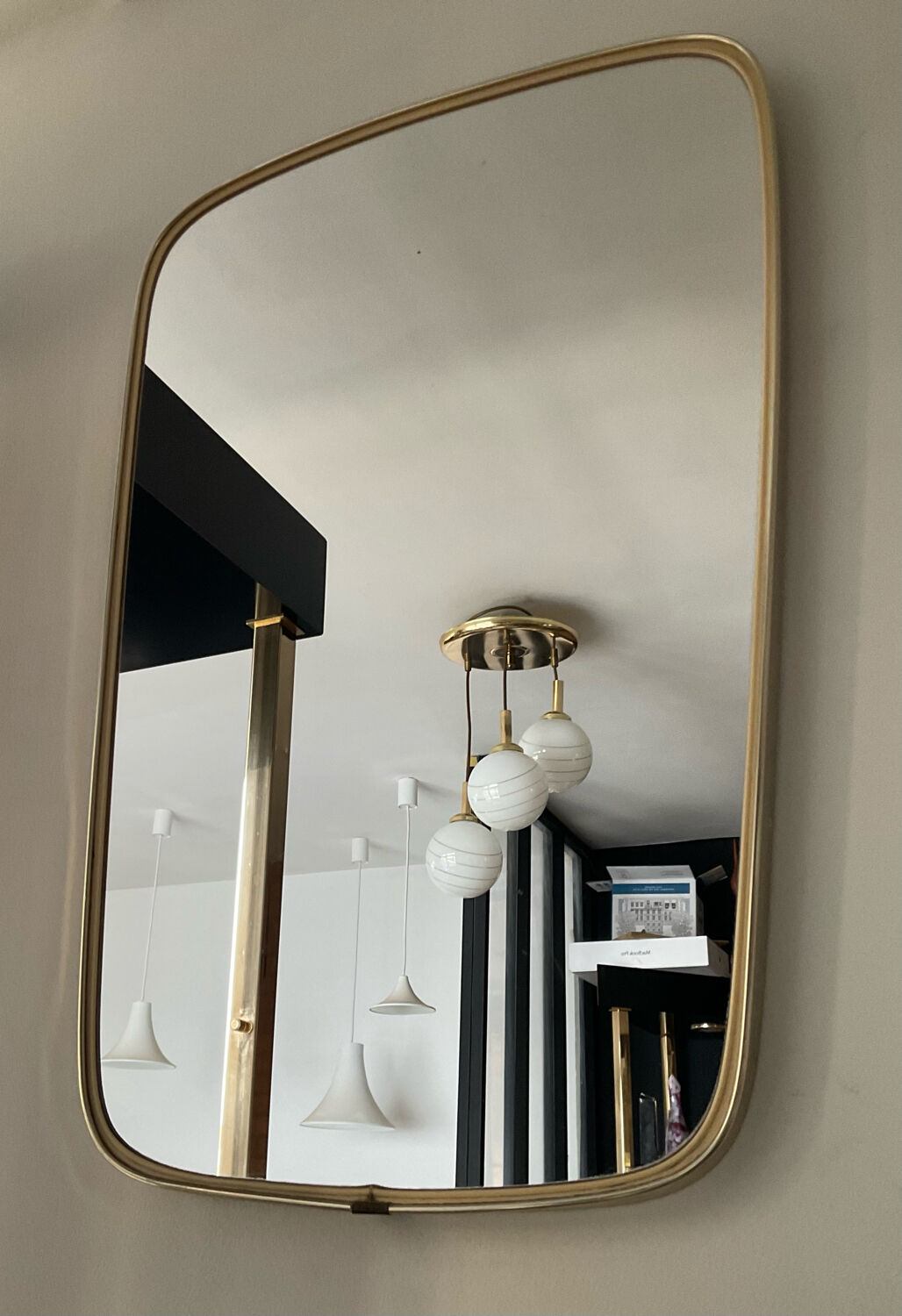 Asymmetrical free-form mirror from the 60s