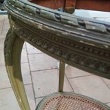 Old oval table with marble top, Louis XVI style
