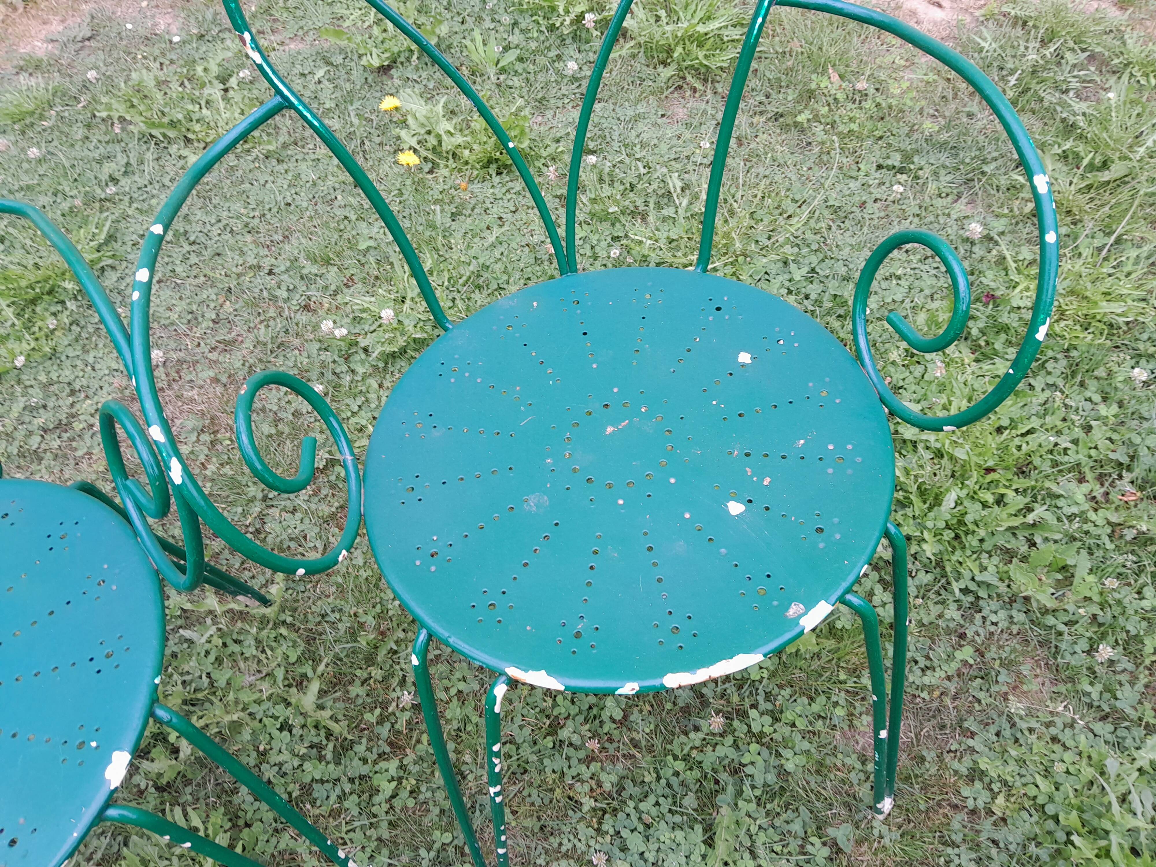 Wrought iron garden lounge table and 2 armchairs