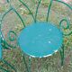 Wrought iron garden lounge table and 2 armchairs