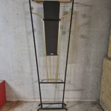 Wall-mounted coat racks in black and gold lacquered metal, circa 1950-1960