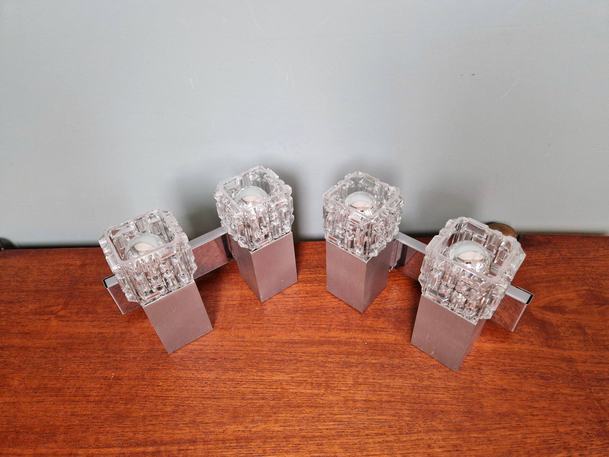 Pair of brushed aluminum and crystal wall lights, 1970s