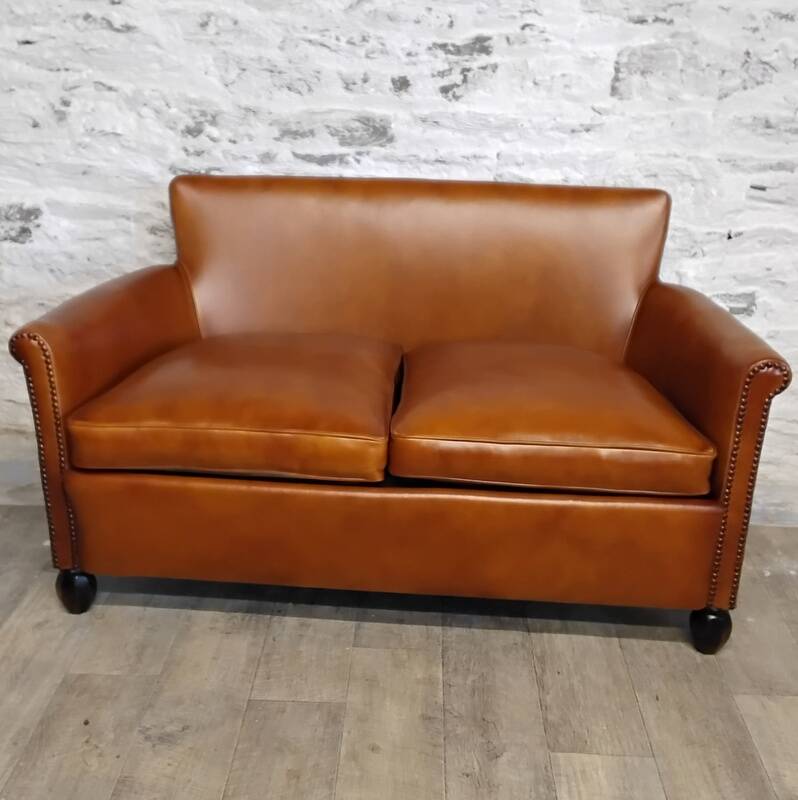 Living room sofa and its 2 club armchairs.