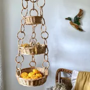Large wicker suspension with three baskets, twisted ring chain.